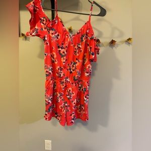 Coral floral romper with peakaboo shoulders